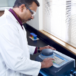 Technician using a turbidity instrument. The versatile standard for grab sample turbidity measurements, Hach lab turbidimeters are engineered to eliminate the mis-match between process turbidity measurements and lab measurements of the same sample. Or, quickly measure multiple samples from multiple sources.